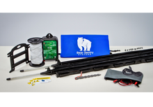 Load image into Gallery viewer, Display of the Bear Sentry electric fence components: 6step in posts, blue bag with logo, polywire, spooler, 1.8 Joule energizer, zipper bag with connector wires and 3M DC extension cord, warning signs and ground stake.