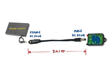 Load image into Gallery viewer, A 3 meter 10 foot DC extension cable is connected to a power supply and the Bear Sentry electric bear fence energizer.