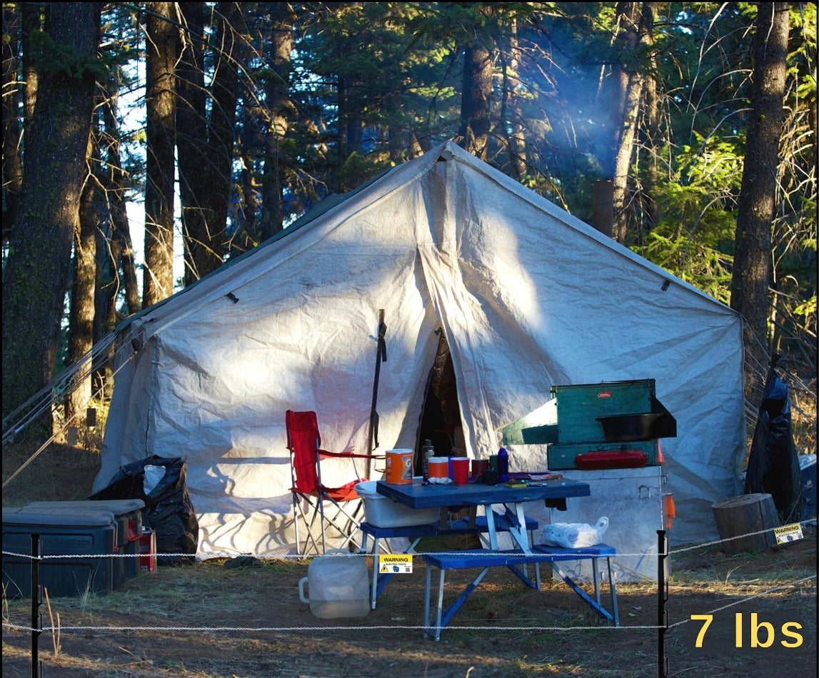 The Base Camp model Bear Sentry portable electric fence far camping with a vehicle in bear country.